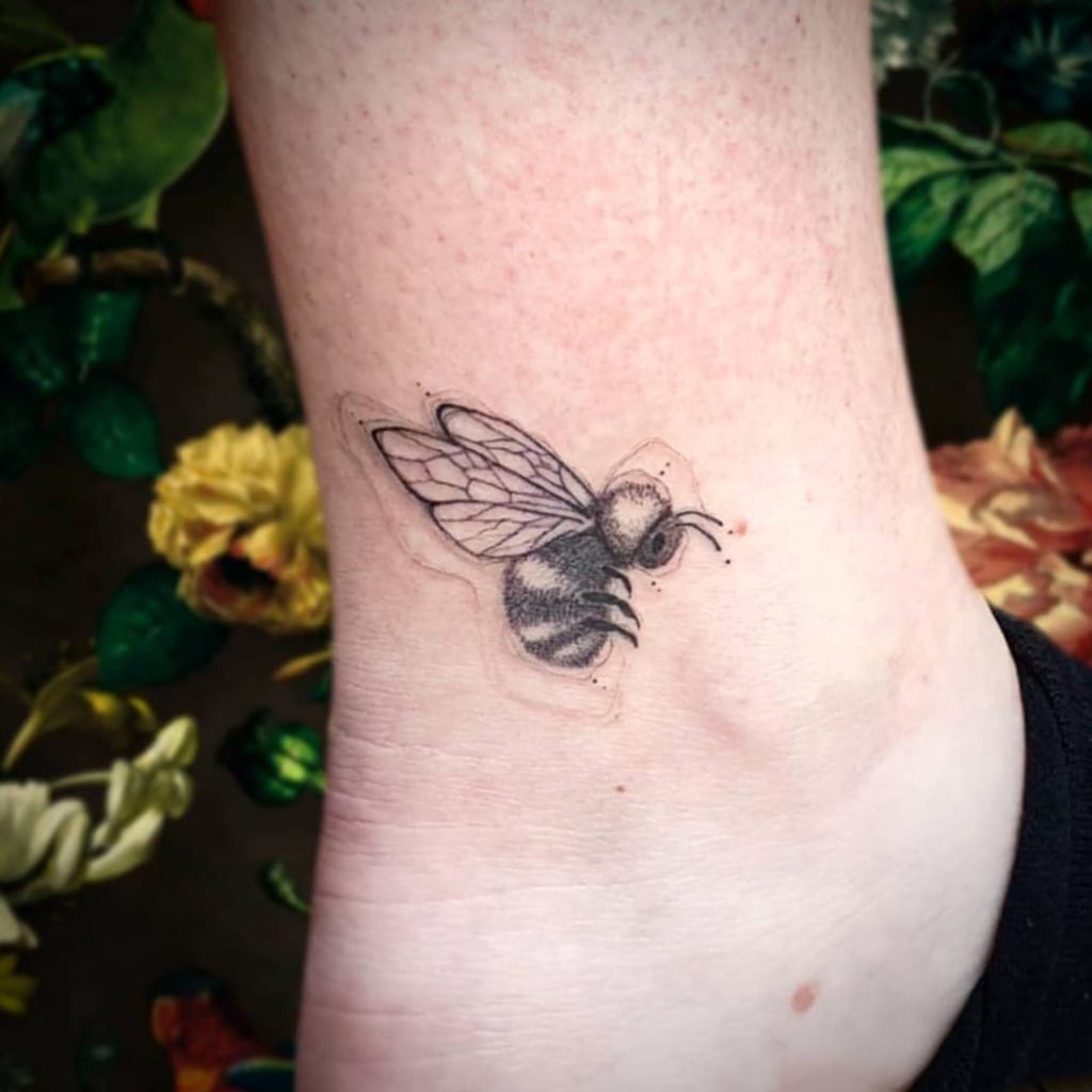 Bee tattoo on ankle
