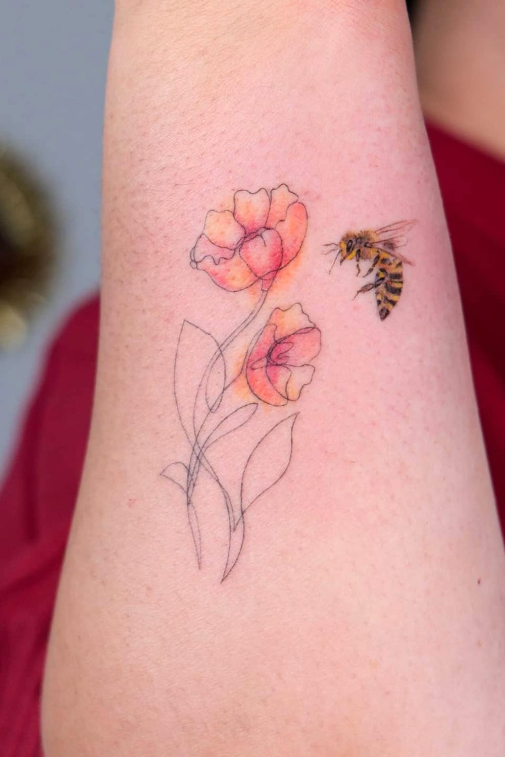 Colorful bee tattoo