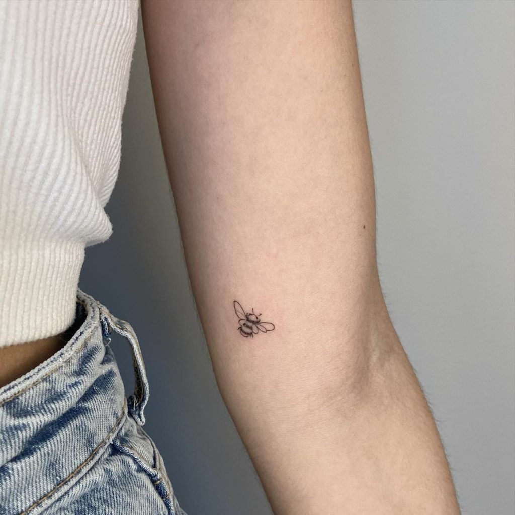 Small bee tattoo