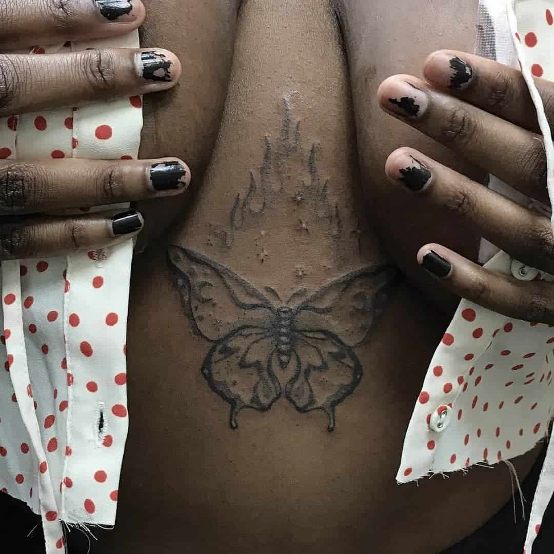 Butterfly Sternum Tattoo