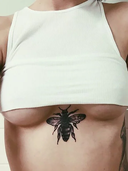 Insect Chest Tattoo