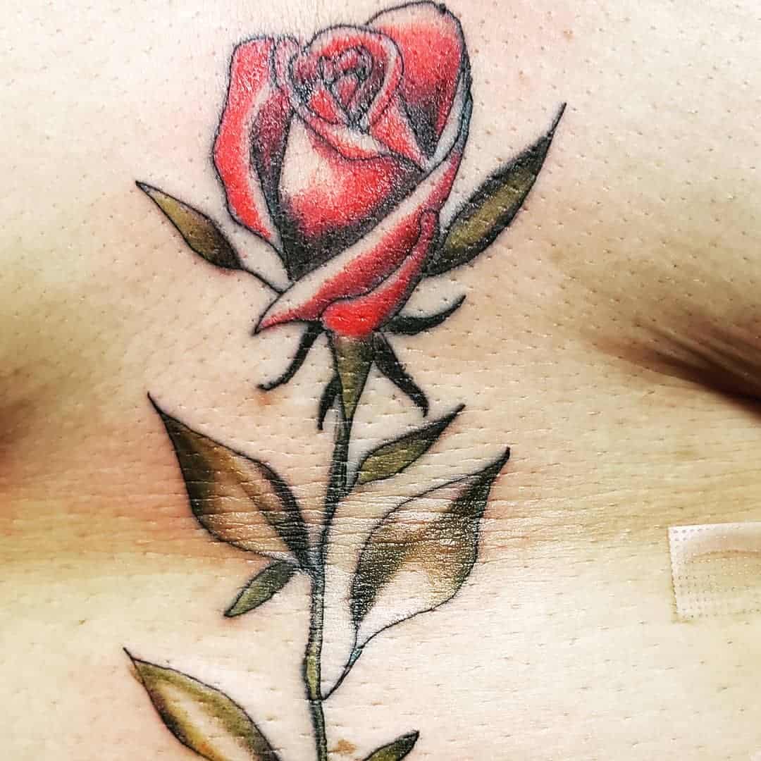 Rose Sternum Tattoo