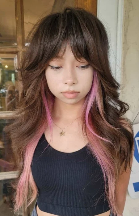 Wolf Haircut with Bold Pink Streaks