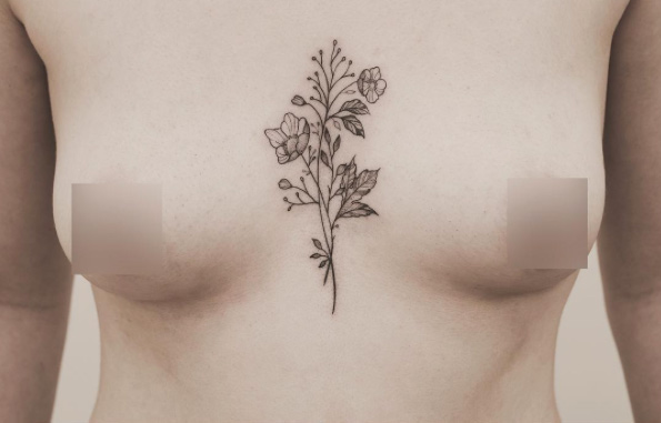 botanical sternum tattoo