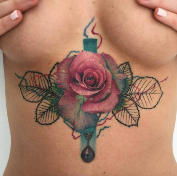 rose sternum tattoo