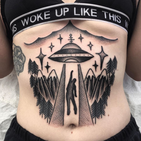 ufo sternum tattoo