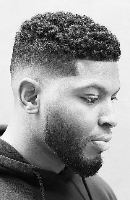 Low fade black man hairstyle