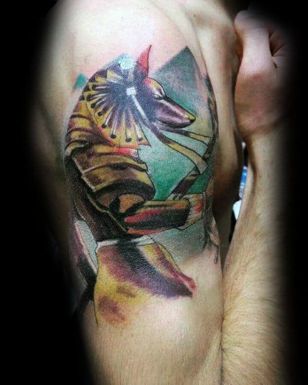 colorful anubis upper arm mens watercolor tattoos