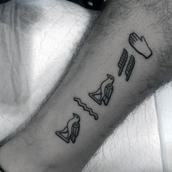 cool male leg hieroglyphics tattoo designs