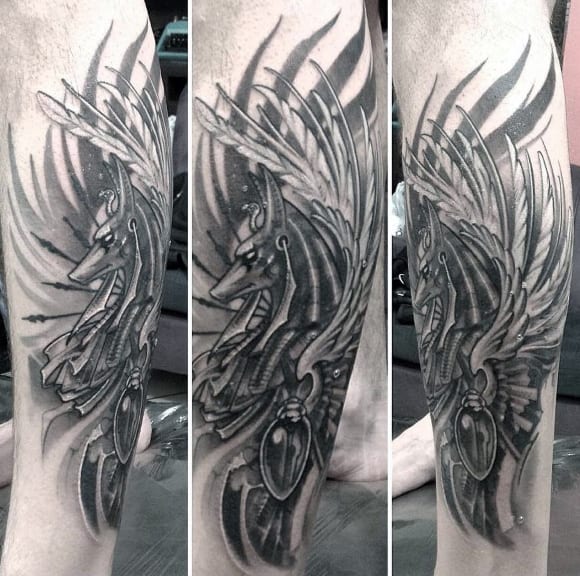 feather shaded anubis leg tattoos for men