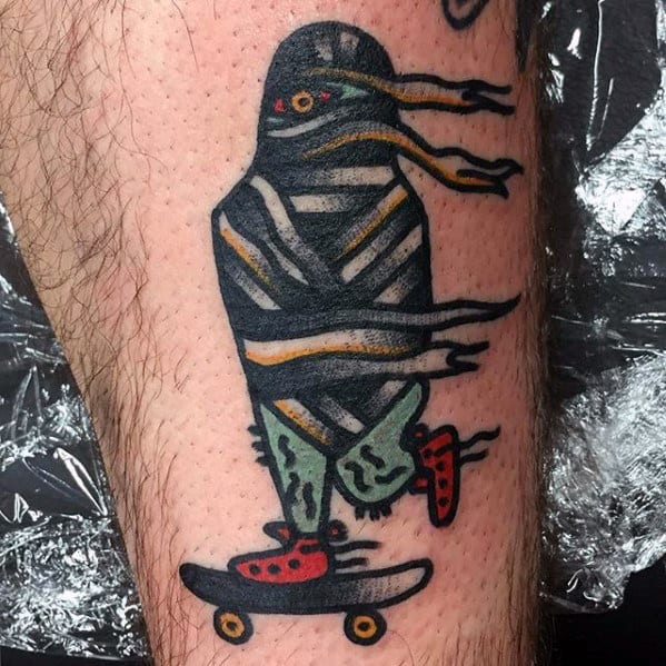 mens skateboarding mummy leg tattoo