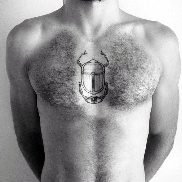 minimalistic scarab mens chest tattoo