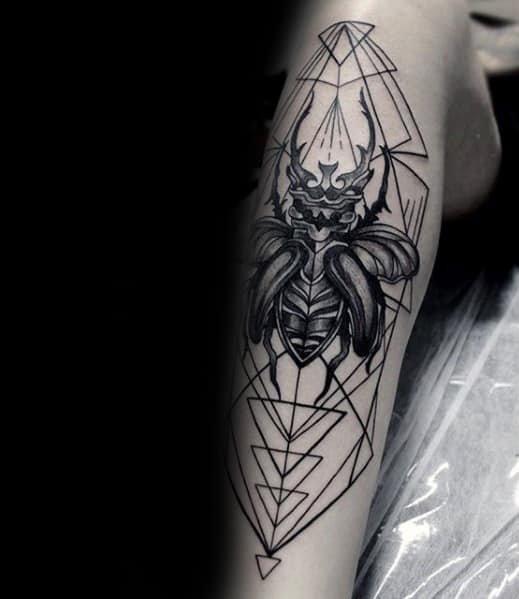 scarab tattoo for men on shin with geometric design