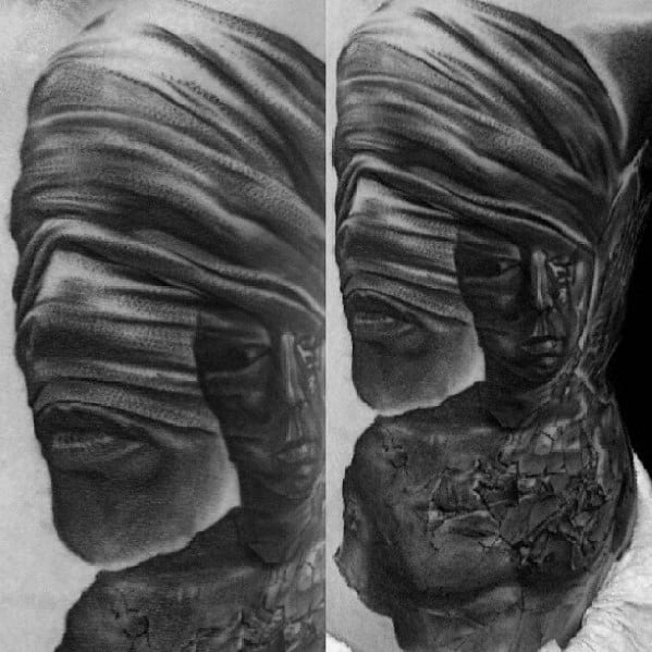shaded black and grey guys mummy rib cage side tattoos
