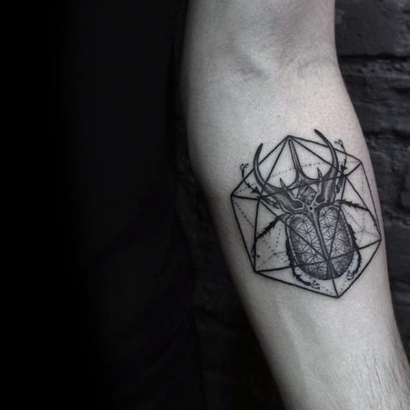 small d geometric scarab bettle inner forearm tattoos for gentlemen