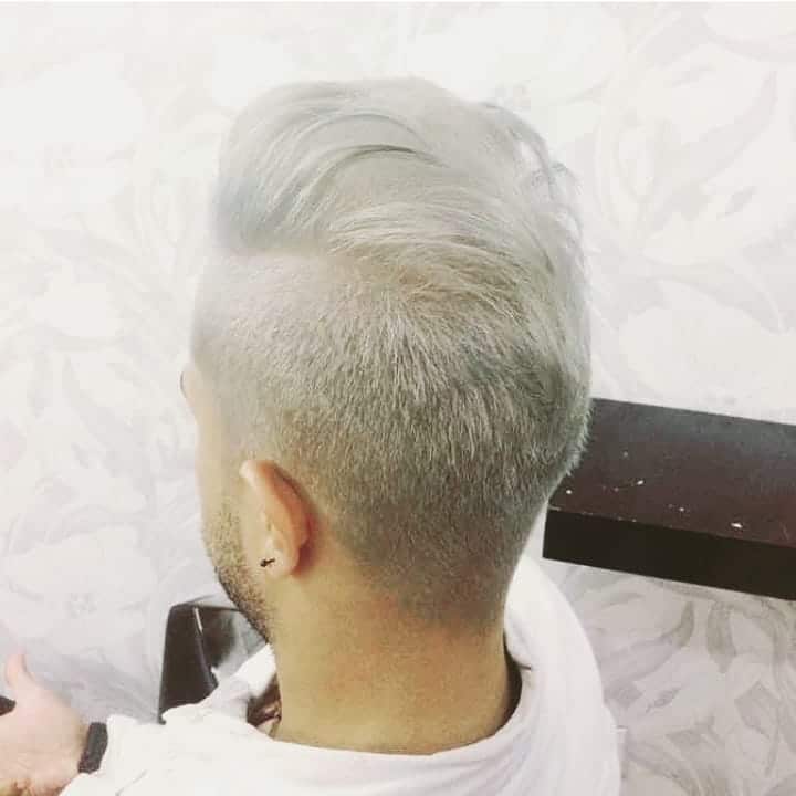 Slicked Back Platinum Haircut