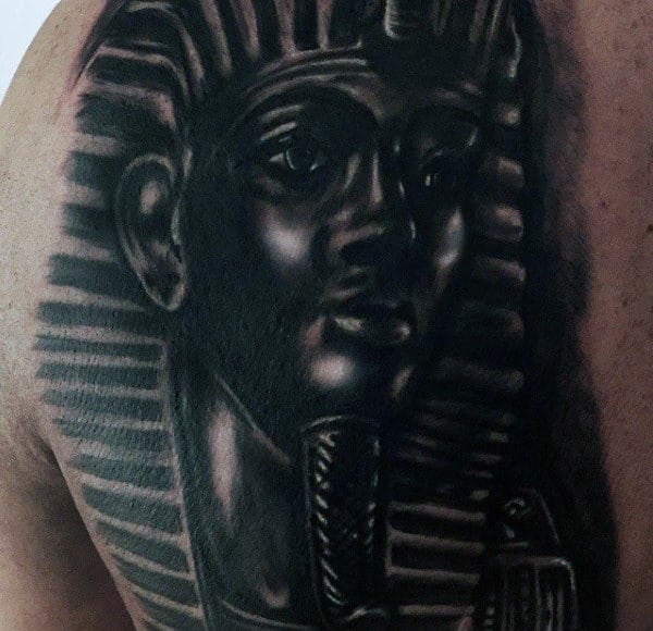 dark black ink king tut mens shoulder tattoo design ideas