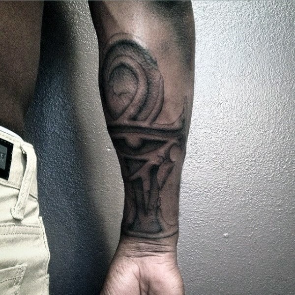 mens realistic stone ankh forearm tattoo