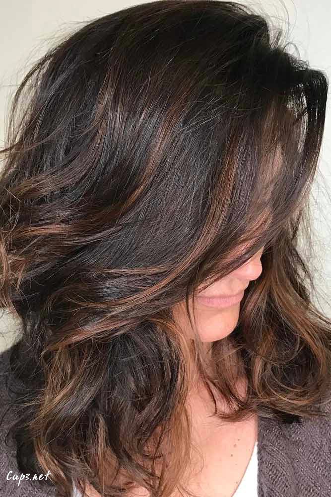 hairstyles for women over 50 new style dark brown color highlighted medium length layered cut side bang