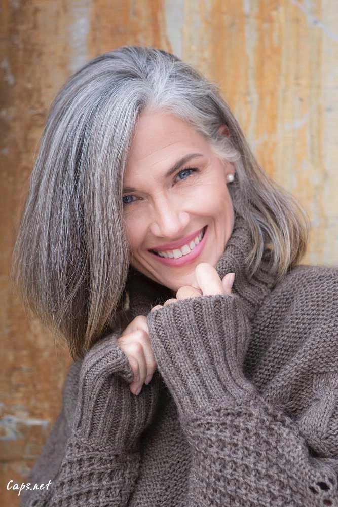 hairstyles for women over 50 new style gray color long bob side swept straight