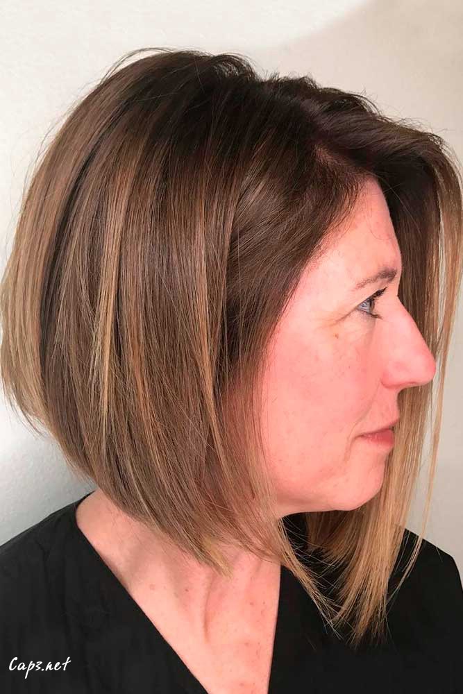 hairstyles for women over 50 new style long inverted bob blonde brown highlights sleek layered