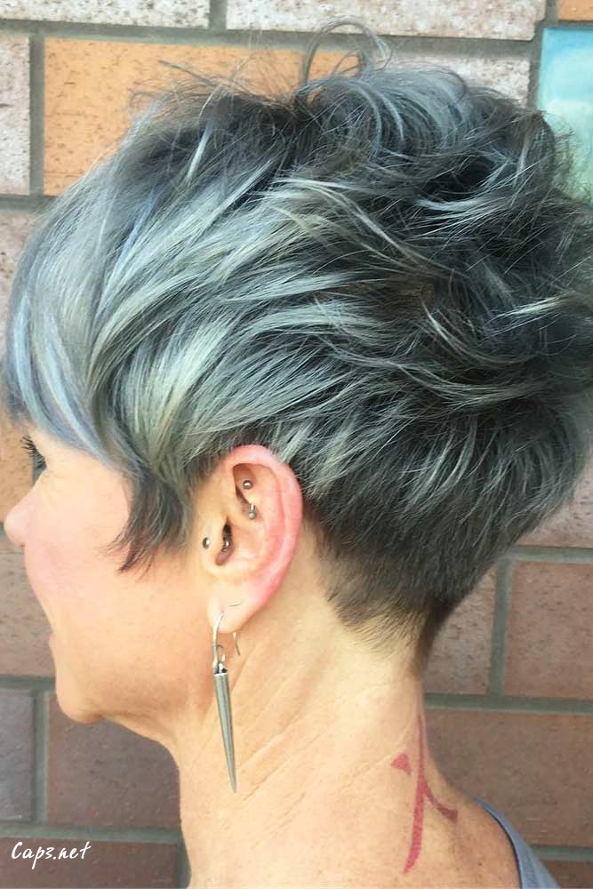 hairstyles for women over 50 new style short pixie side bang blue silver color messy edgy cut