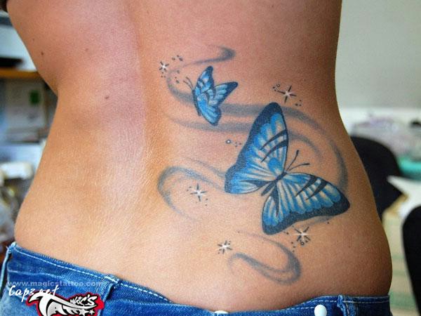 7 Butterfly lower back tattoo