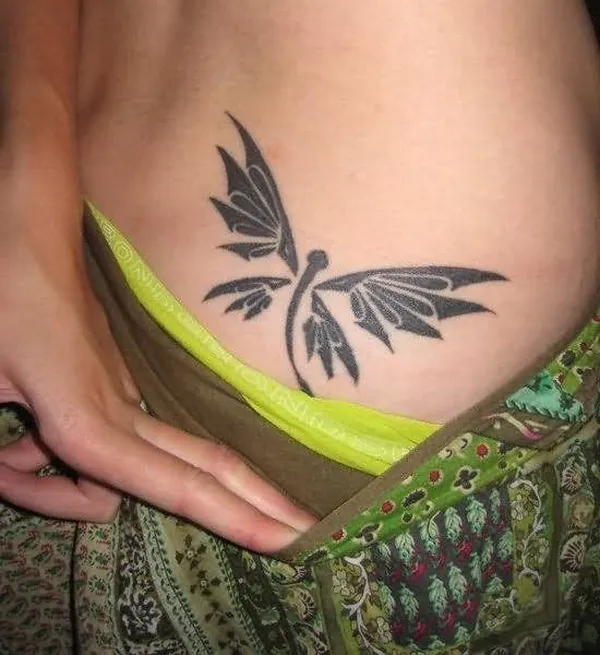 Black Dragonfly Tattoo On Lower Back