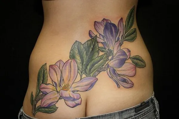 Magnolias Tattoo On Lower Back