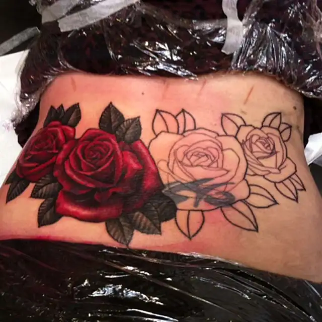 lower back rose flower cover up tattoos