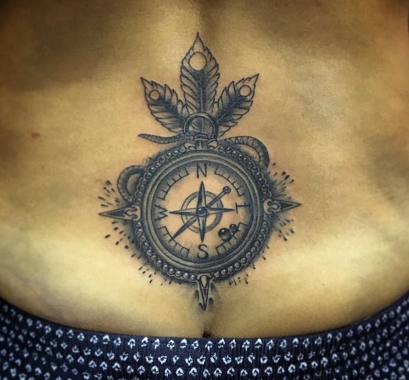 compass lower back tattoos