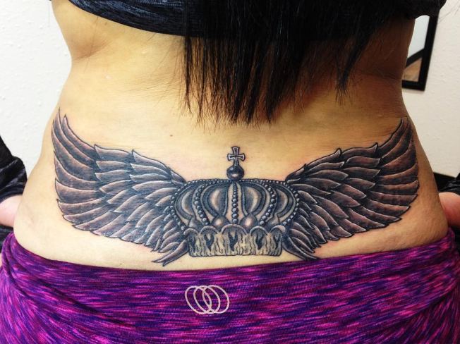 crown lower back tattoos