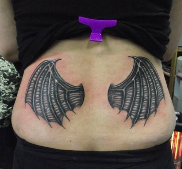 devils wings lower back tattoos
