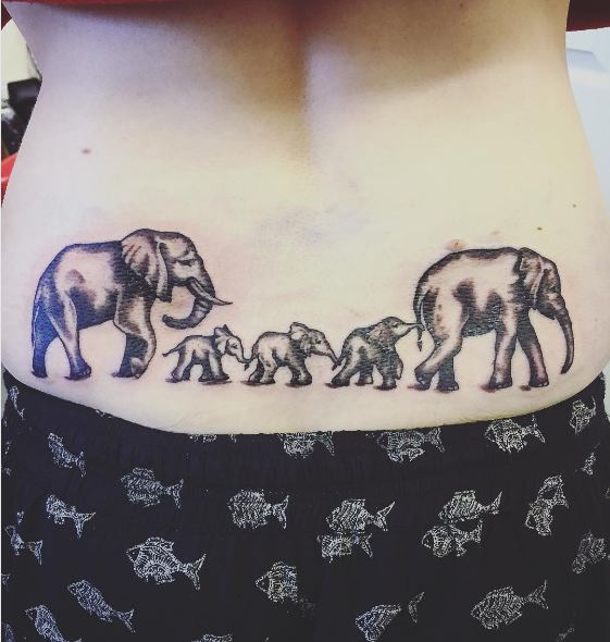 elephant lower back tattoos