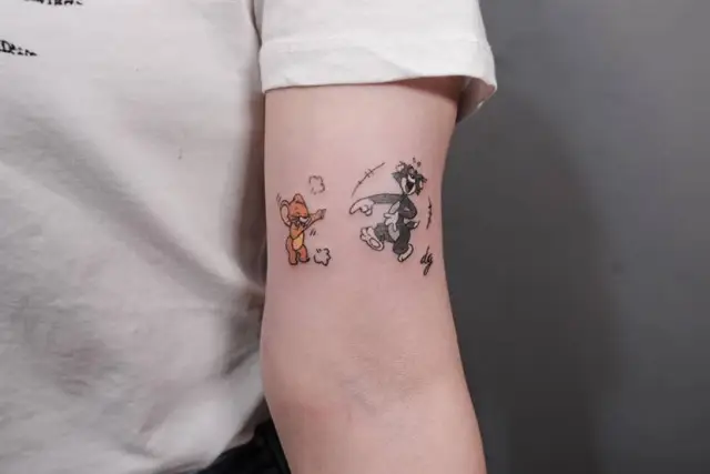 funny tiny tom and jerry cartoon tattoo