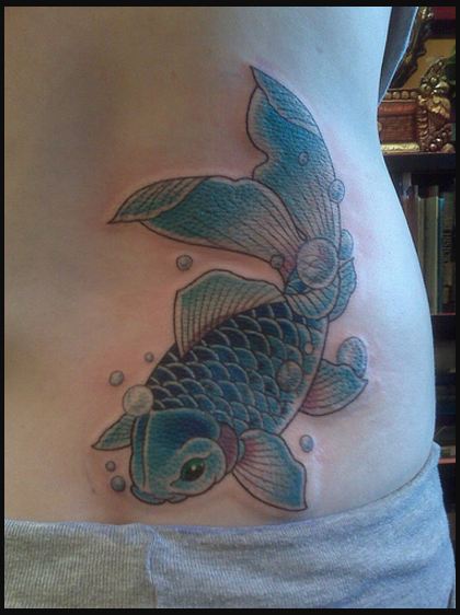 koi fish lower back tattoos