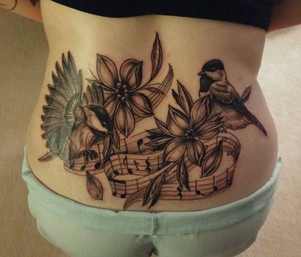 music lower back tattoos