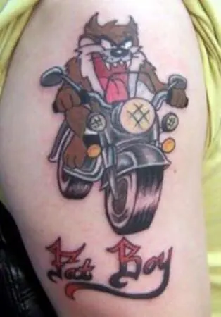 tasmanian devil riding bike tattoo