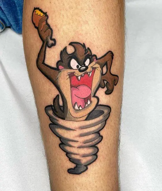 tasmanian devil tattoo holding meal tattoo