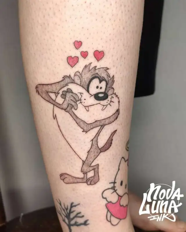 tasmanian devil with hearts tattoo