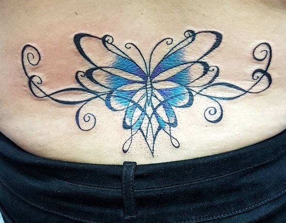 tribal butterfly lower back tattoos