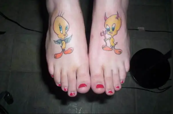 angel and devil tweety bird tattoos on foot