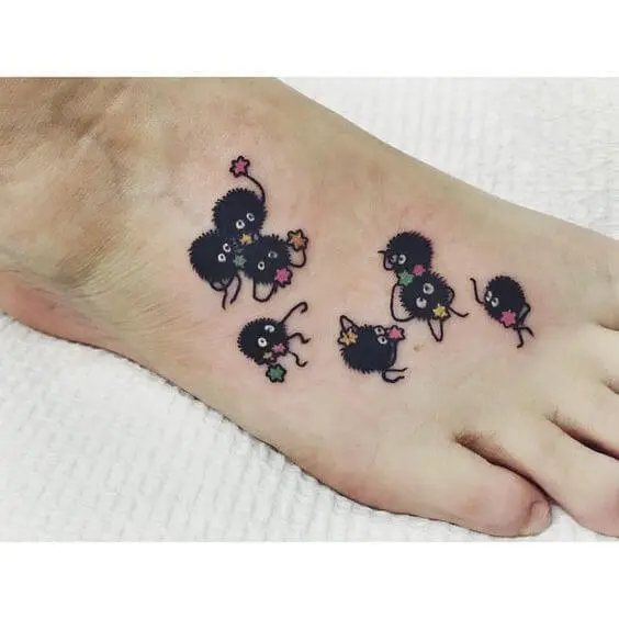 soot sprite tattoos on foot