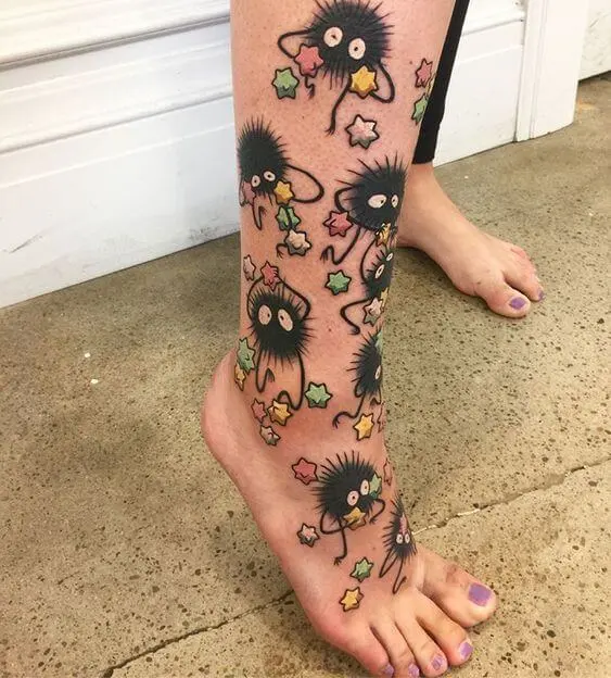 soot sprite tattoos on lower leg