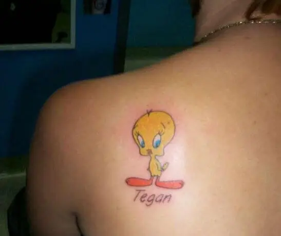 tweety bird tattoo on back shoulder blade