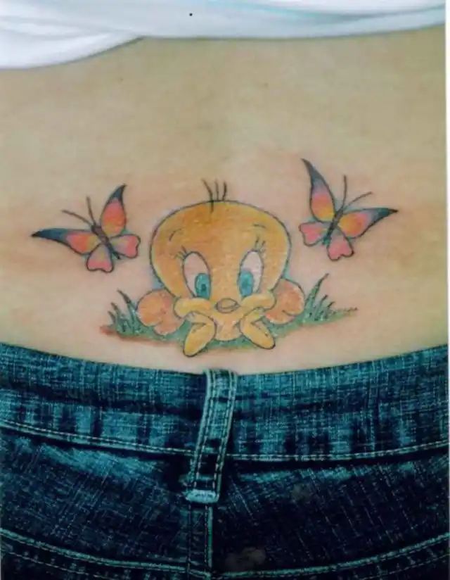 tweety bird tattoo on lower back
