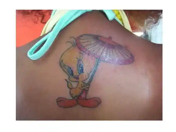 tweety bird with umbrella tattoo design on back