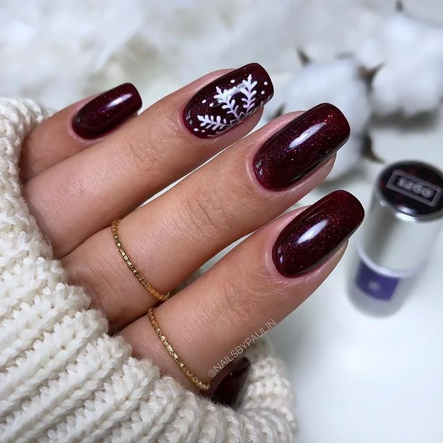 Burgundy Nail With Snowflakes