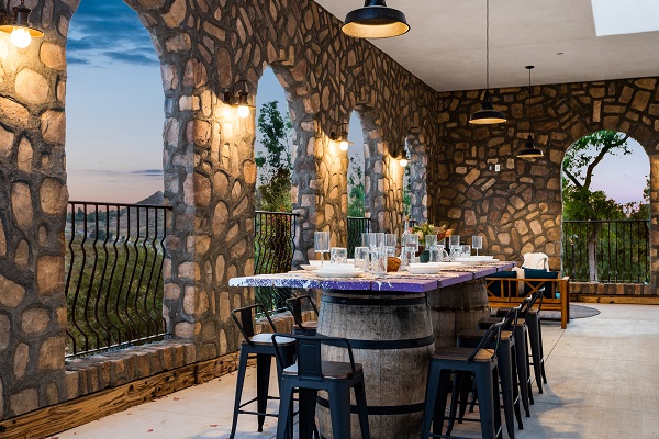 Malibu Modern Villa dining room stone sccent wall
