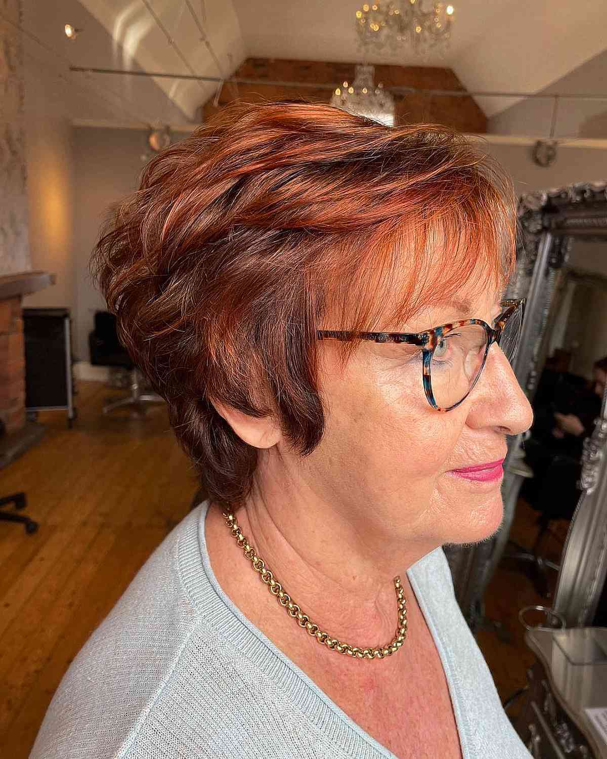dark auburn feathered bob for year olds with glasses
